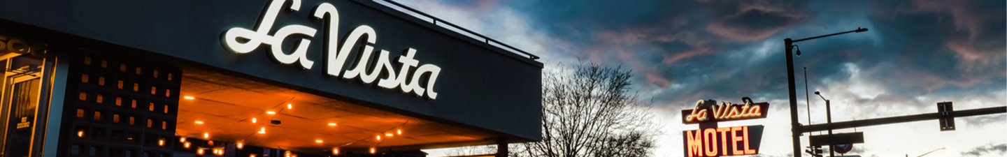 Exterior of La Vista hotel at sunset