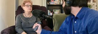 Clela Rorex being interviewed in her house.