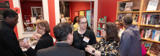 A group of people smile at a Colorado Black Equity Study Event at CCWH