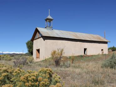 A photograph of Our Lady of Guadalupe Church in Medina Plaza