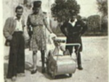 picture of family by farmhouse