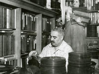 Fred and Jo Mazzulla among their music collection, 1954.