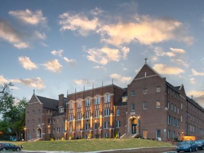 Exterior of Pancratia Hall at sunset.